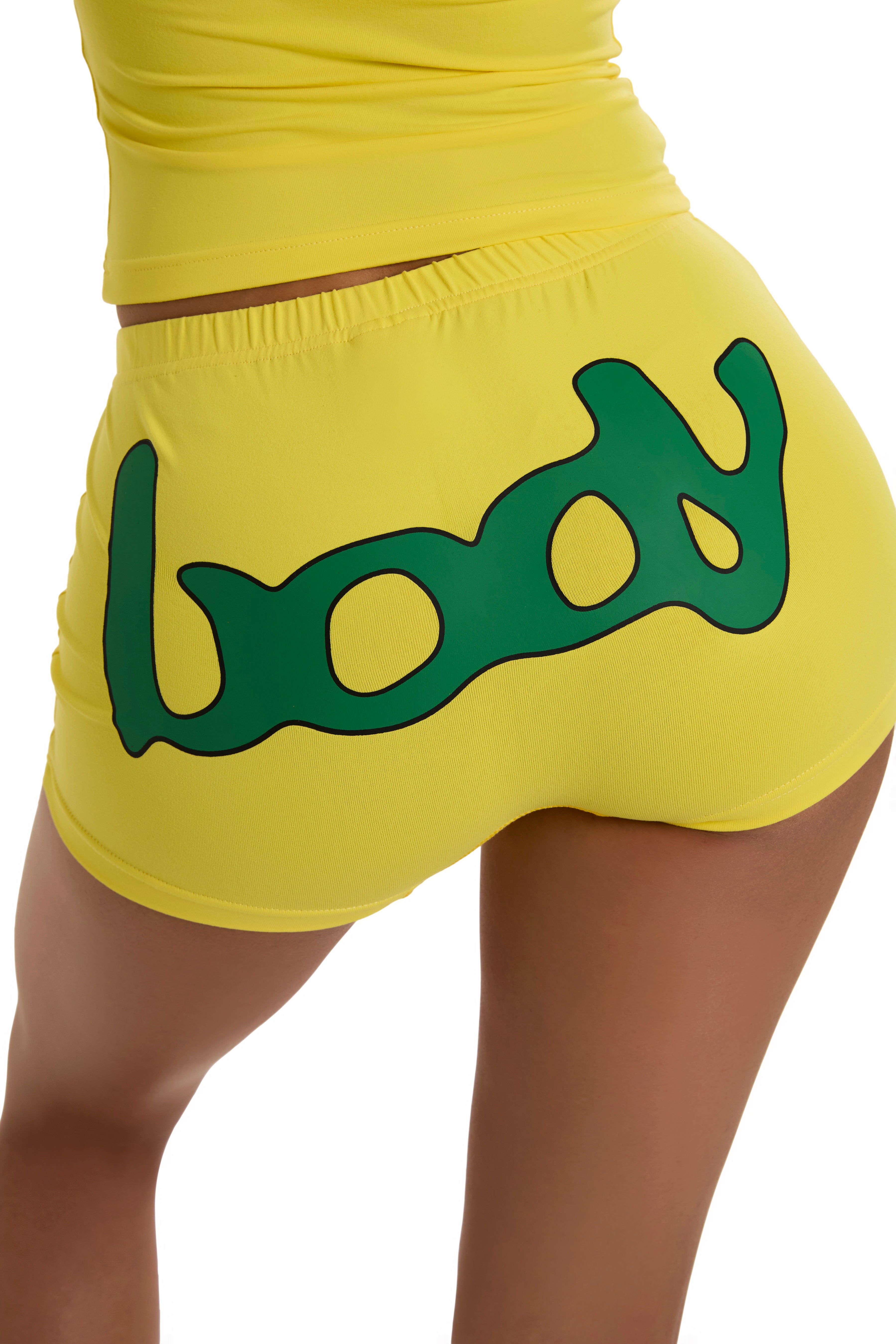 BODY X LATTO MINI SHORTS (YELLOW/GREEN)