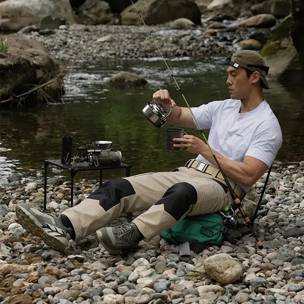 Men's Tactical Work Pants are equipped with a stretched waistband and pockets